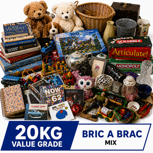 A large assortment of household, toy, book, and game items piled together on a white background, with teddy bears, a wicker basket, Scrabble, Monopoly, Harry Potter, and other assorted goods visible. A blue and white banner at the bottom reads '20KG VALUE GRADE BRIC A BRAC MIX'.
